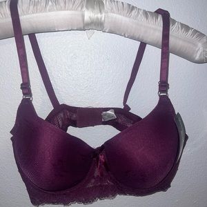 Romantic style bra 40C with under wire and padded support.